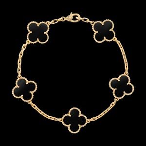 Vintage Alhambra bracelet, 5 motifs
Yellow gold, Onyx

$ 3,900